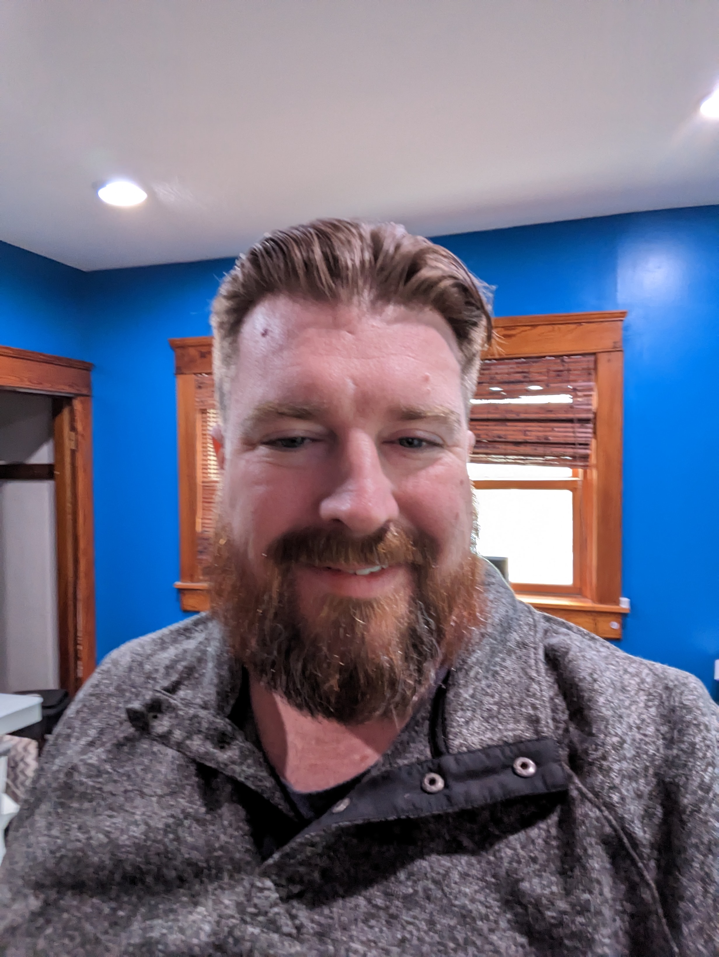 Image of a handsome man who looks like he'd fit in on a starship.